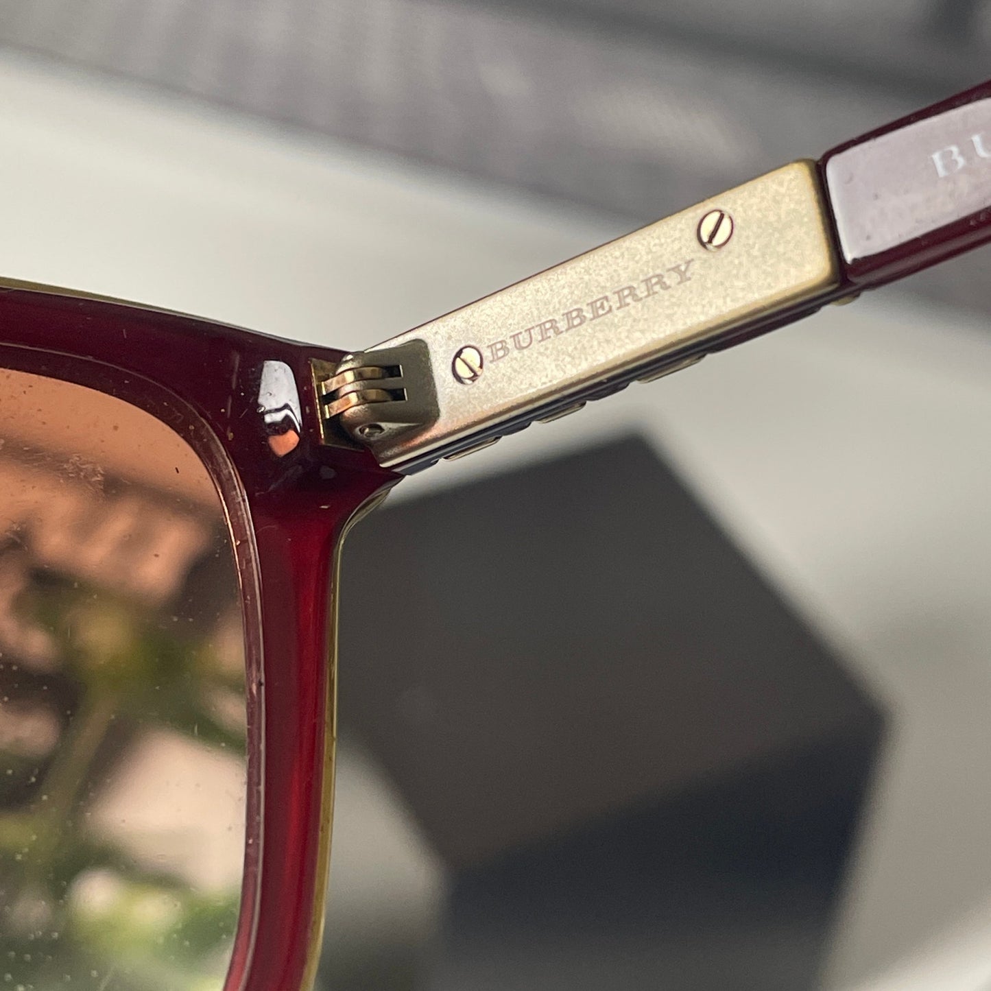 Burberry rounded red tinted sunglasses