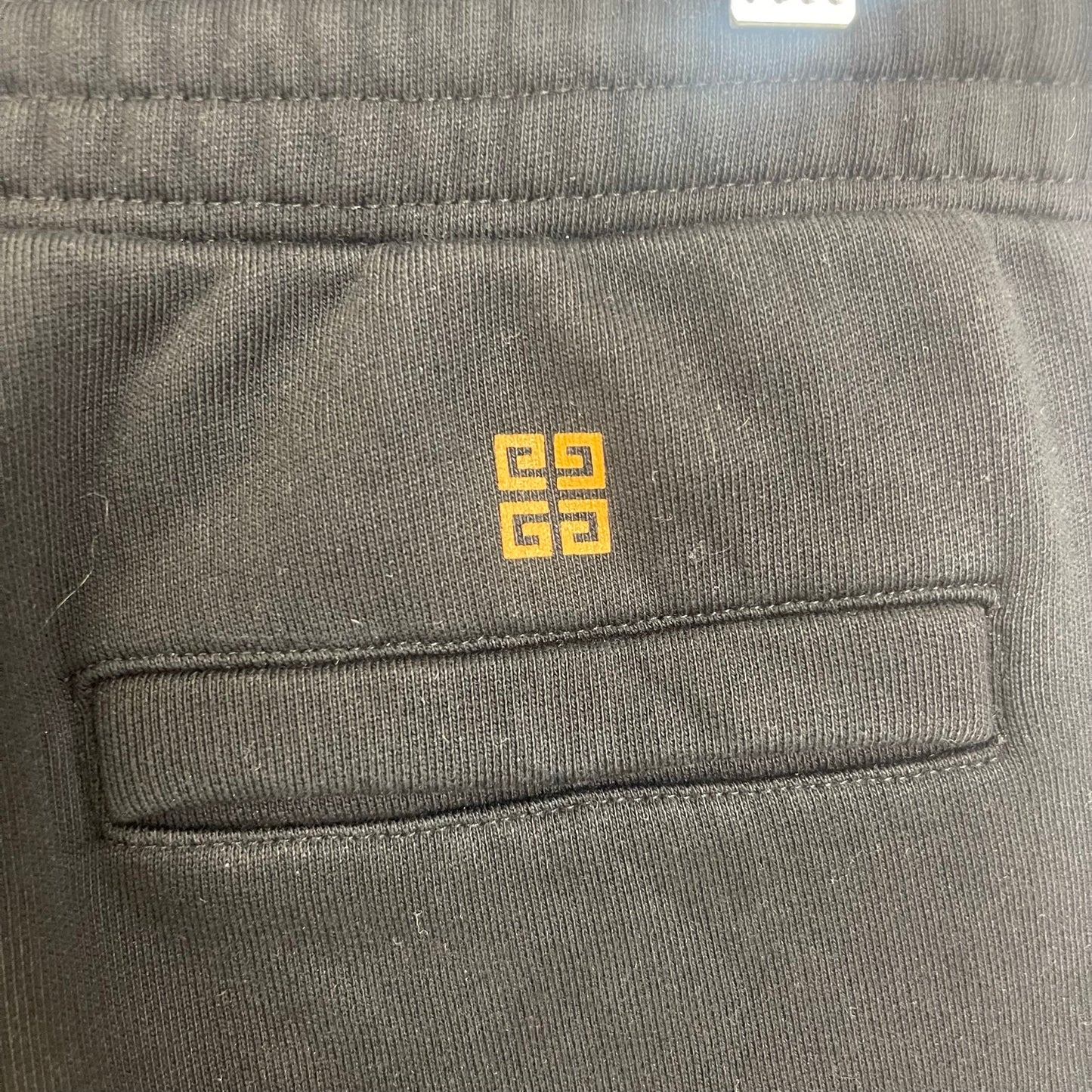 Givenchy star print logo sweatpants M