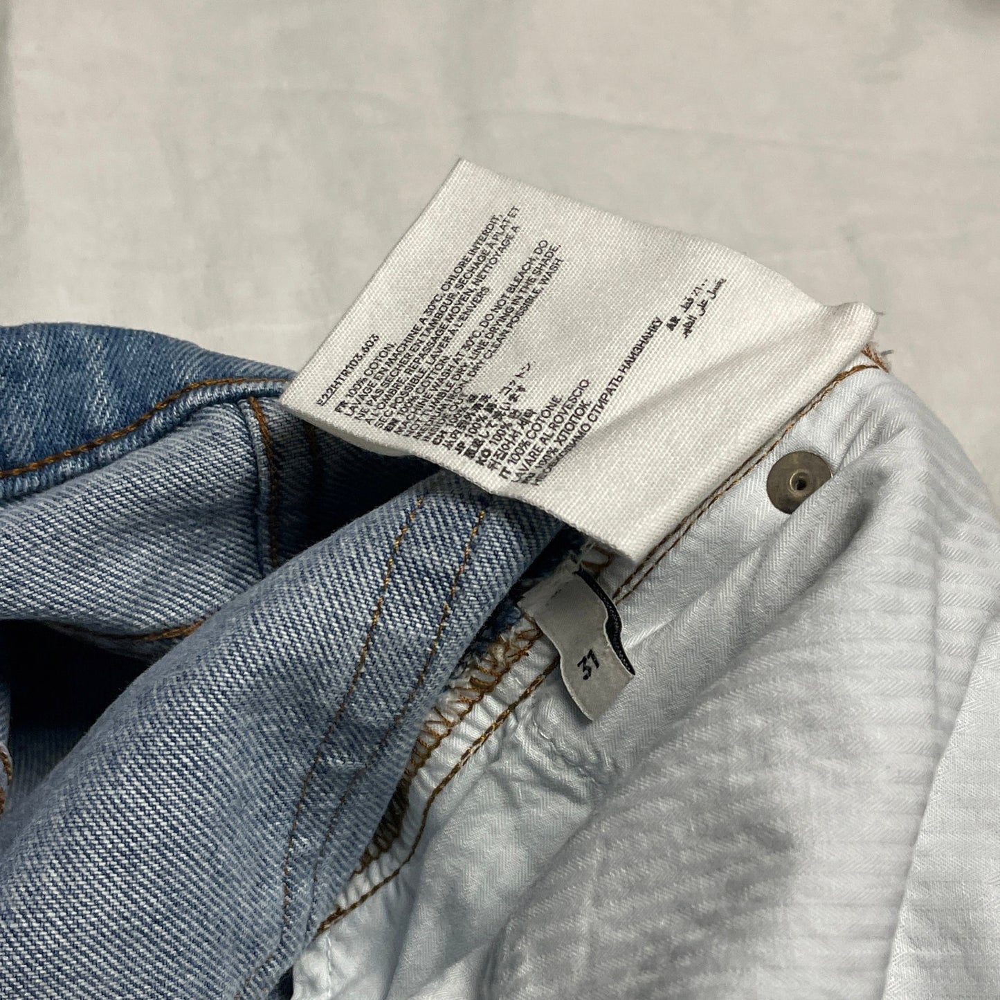 AMI tapered leg lightwash jeans 31
