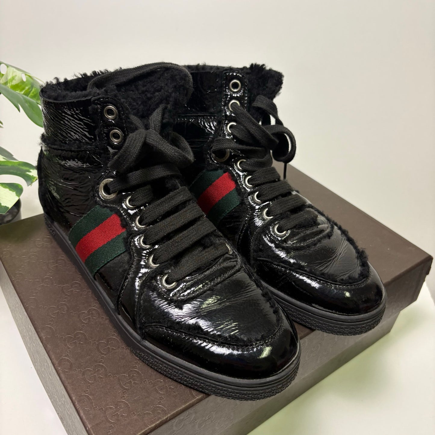 Gucci leather black hi top fuzzy sneakers 6w