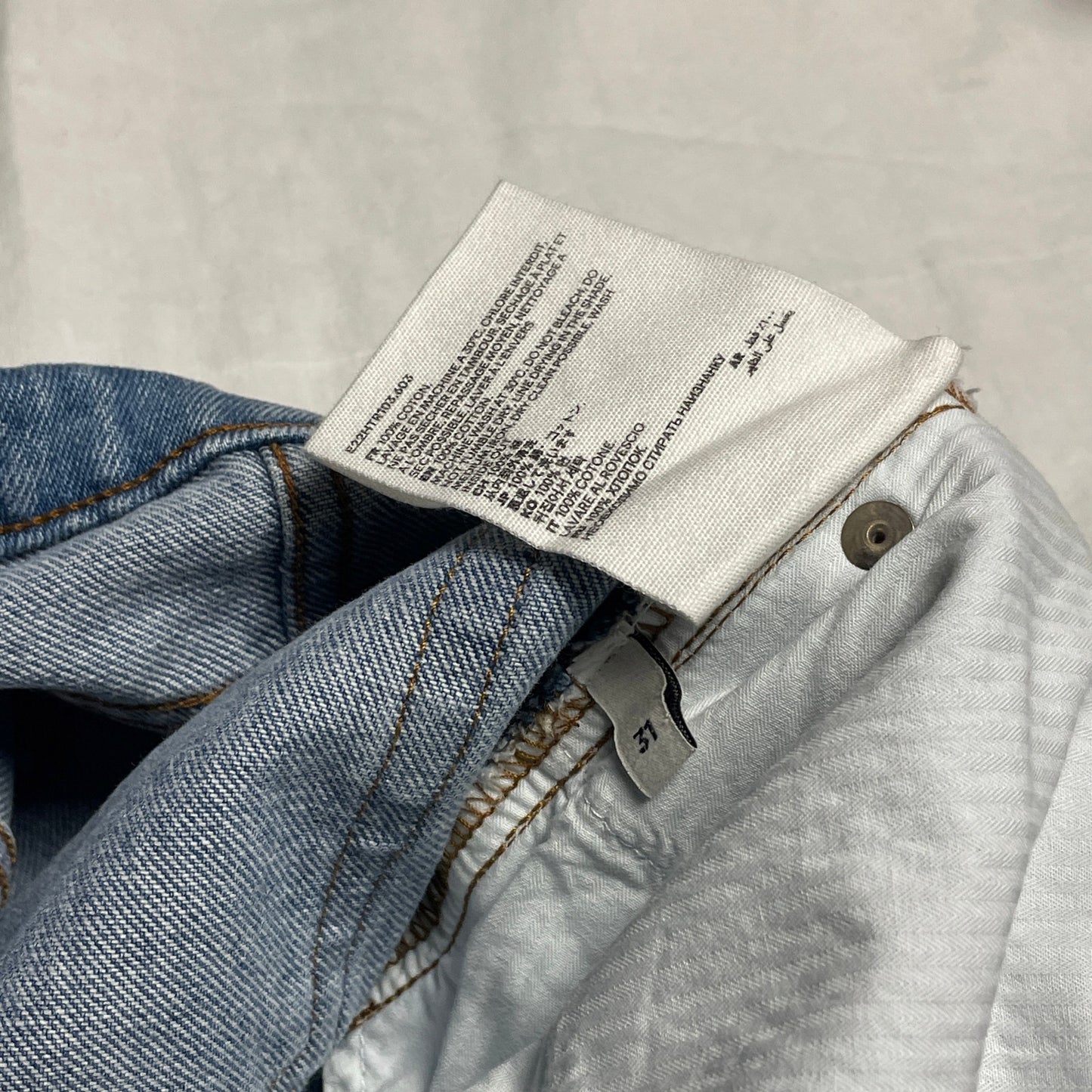 AMI tapered leg lightwash jeans 31