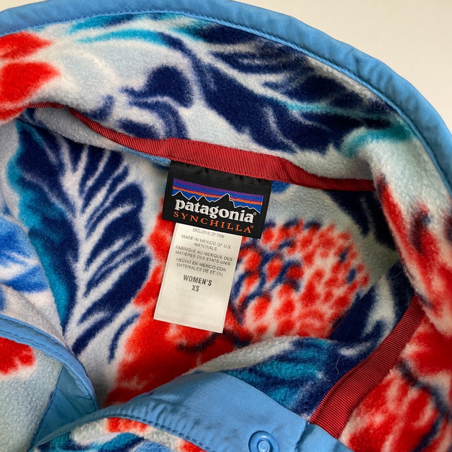 Patagonia floral 1/4 snap synchilla fleece S